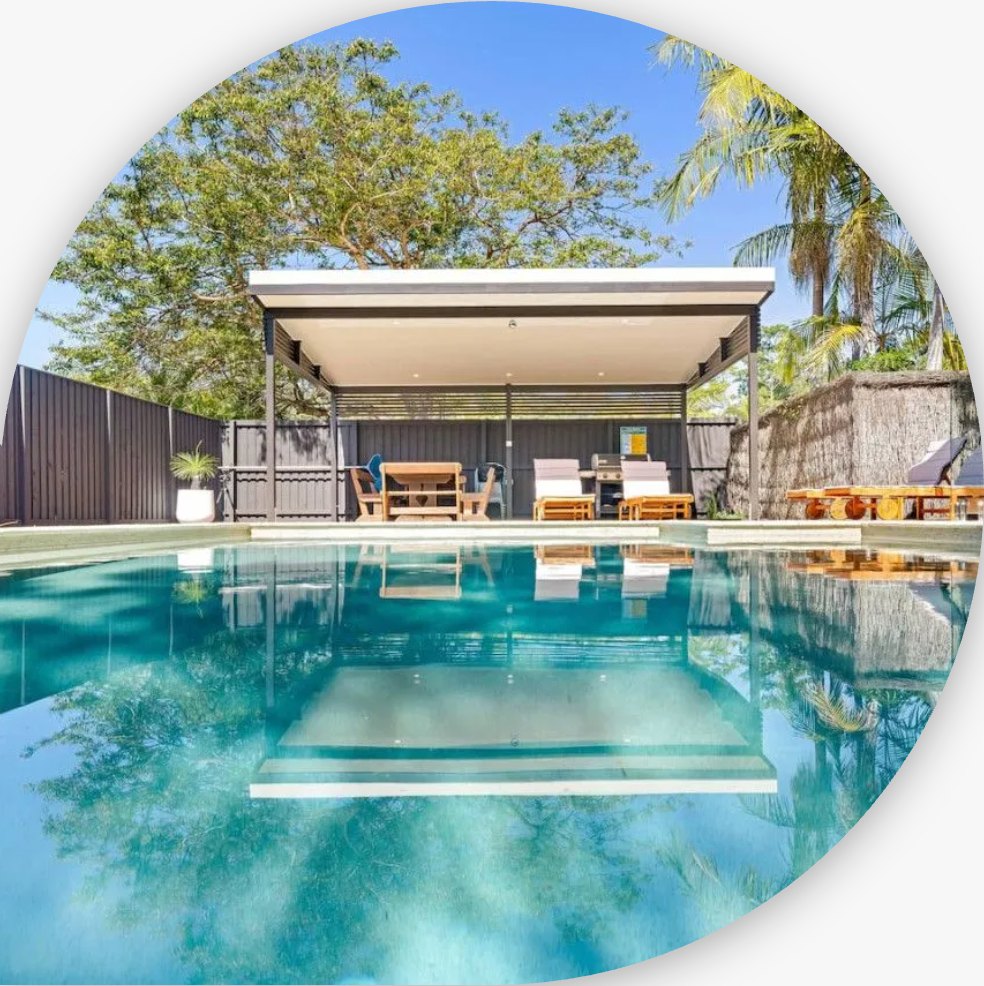 Resort-style swimming pool and cabana at an Intrepid BnB Hosts managed property