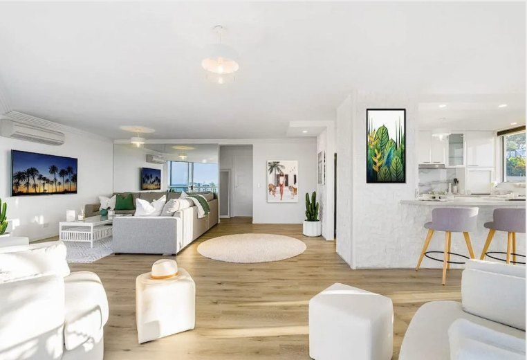Spotless open-plan living room and kitchen ready for guests