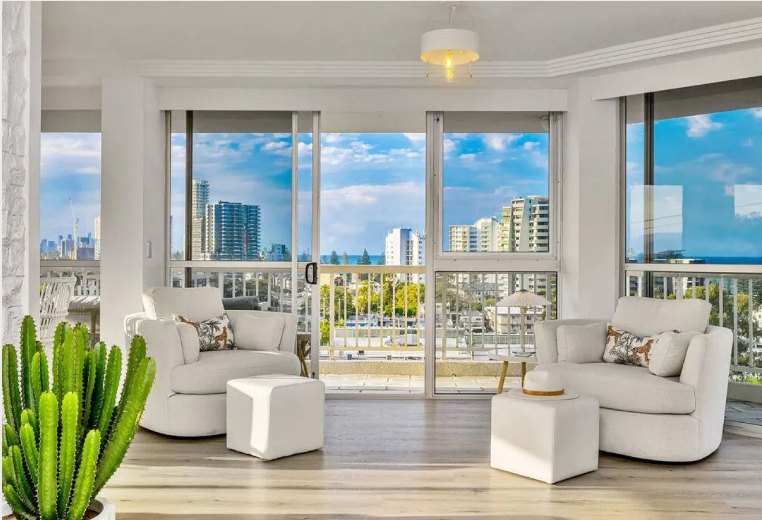 Apartment lounge with city skyline views