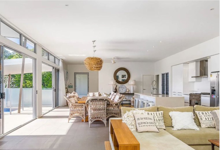 Well-maintained living and dining area opening to a garden